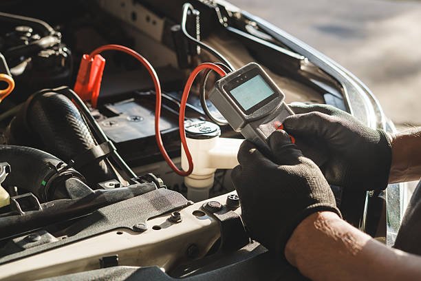 Vehicle undergoing an emissions test at an inspection center